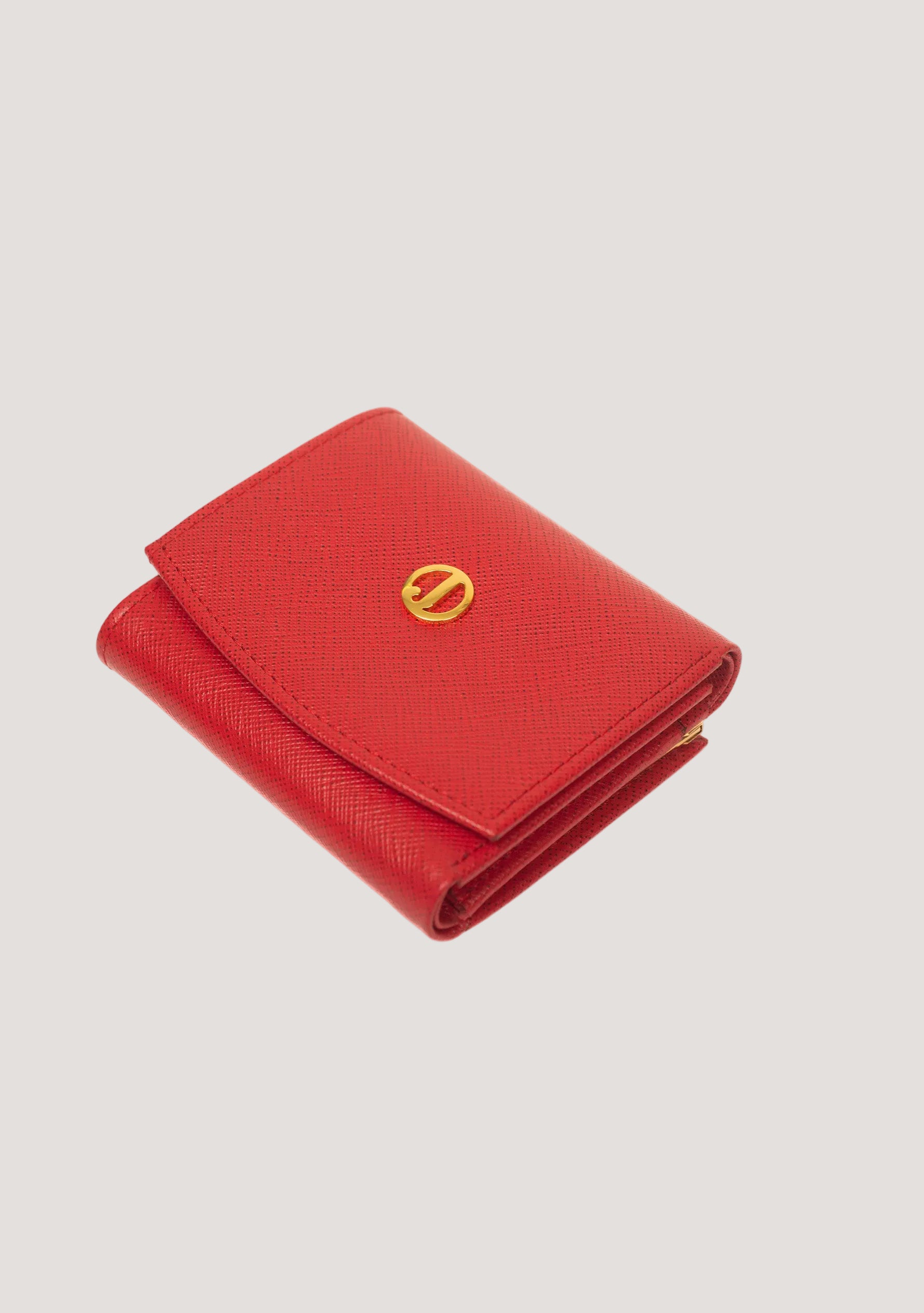 Red wallet with a gold logo on a white background